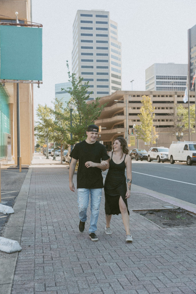 casual couple walking in downtown