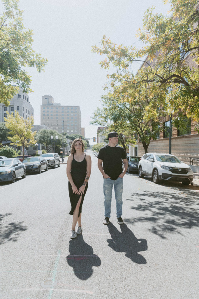 couple standing in the street