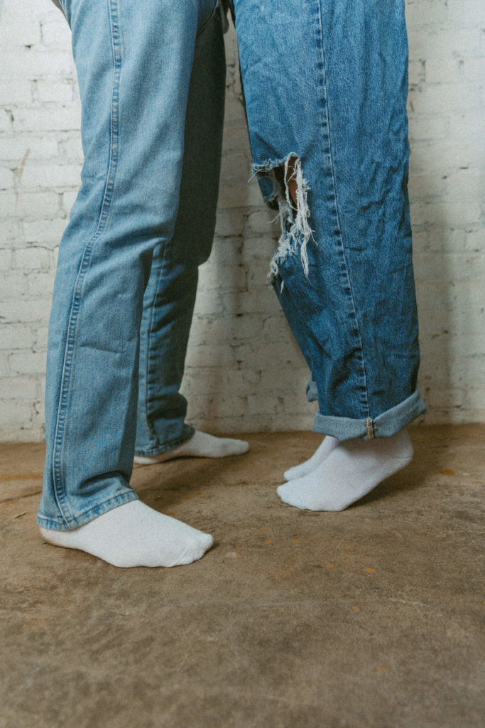 couple standing on toes 