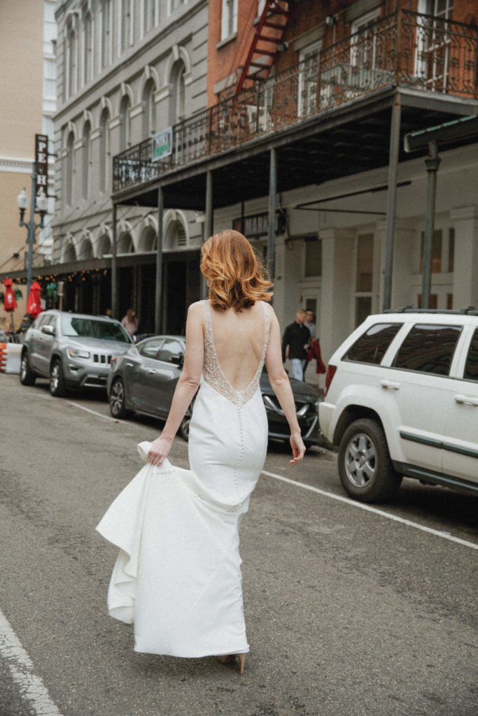 bride walking in the streets of new orleans 