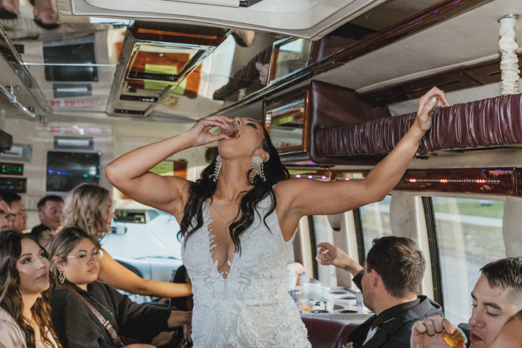 bride taking shots on party bus 