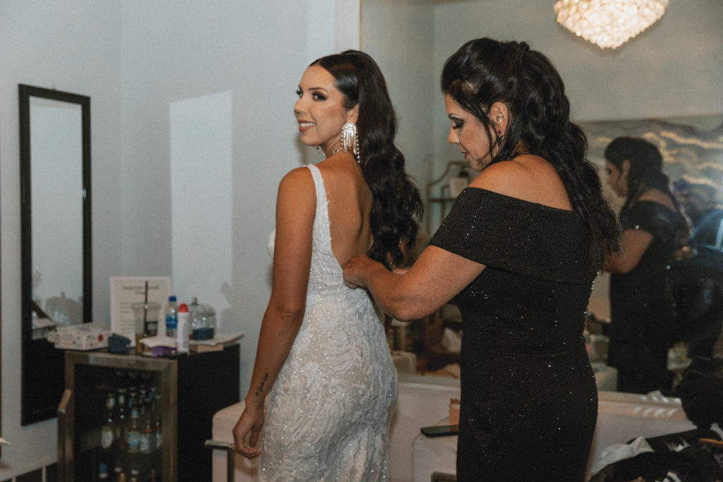bride and mom getting ready