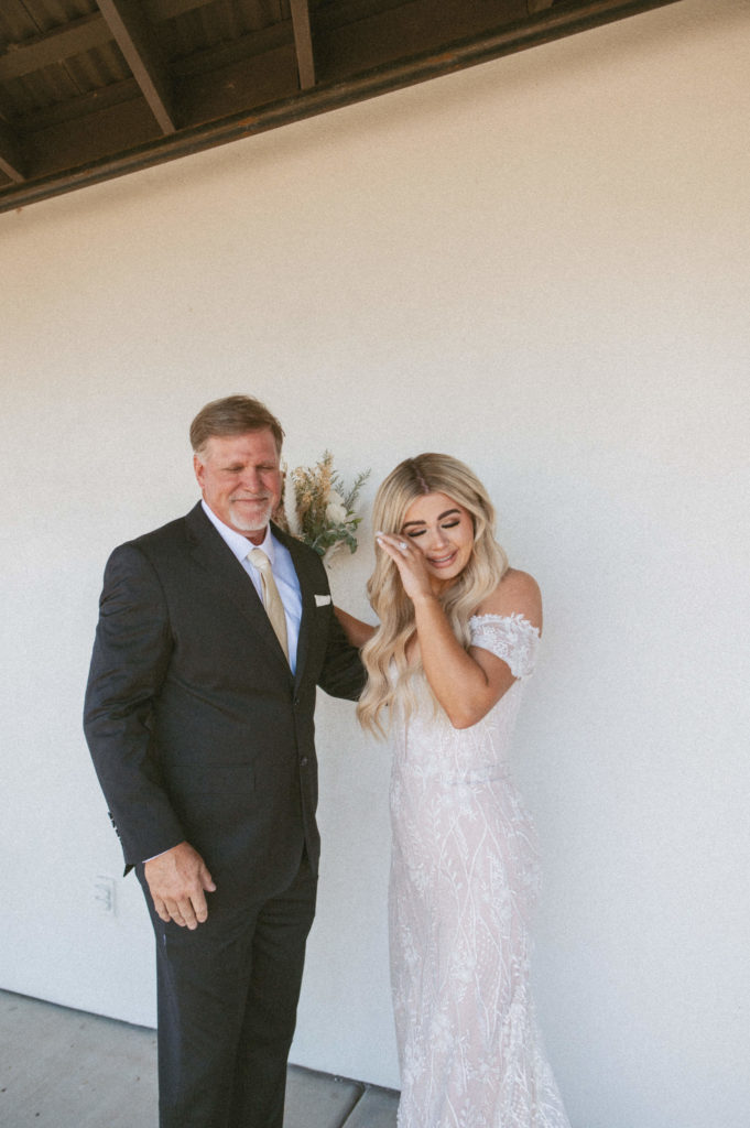bride and dad crying 