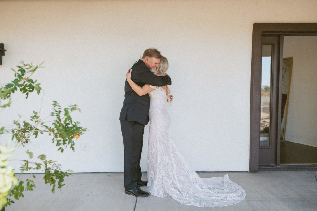 bride & dad hugging 