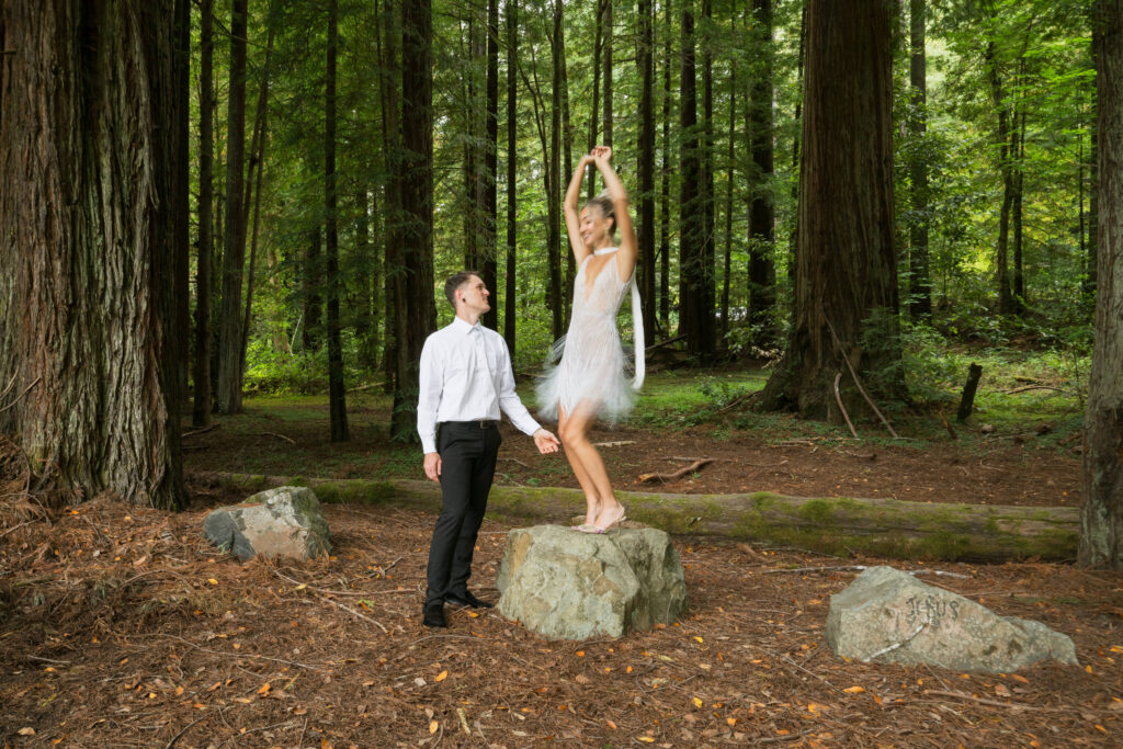 bride and groom dancing in the redwoods 