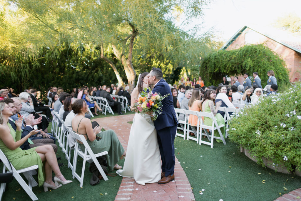 bride and groom first kiss at Kingan Gardens