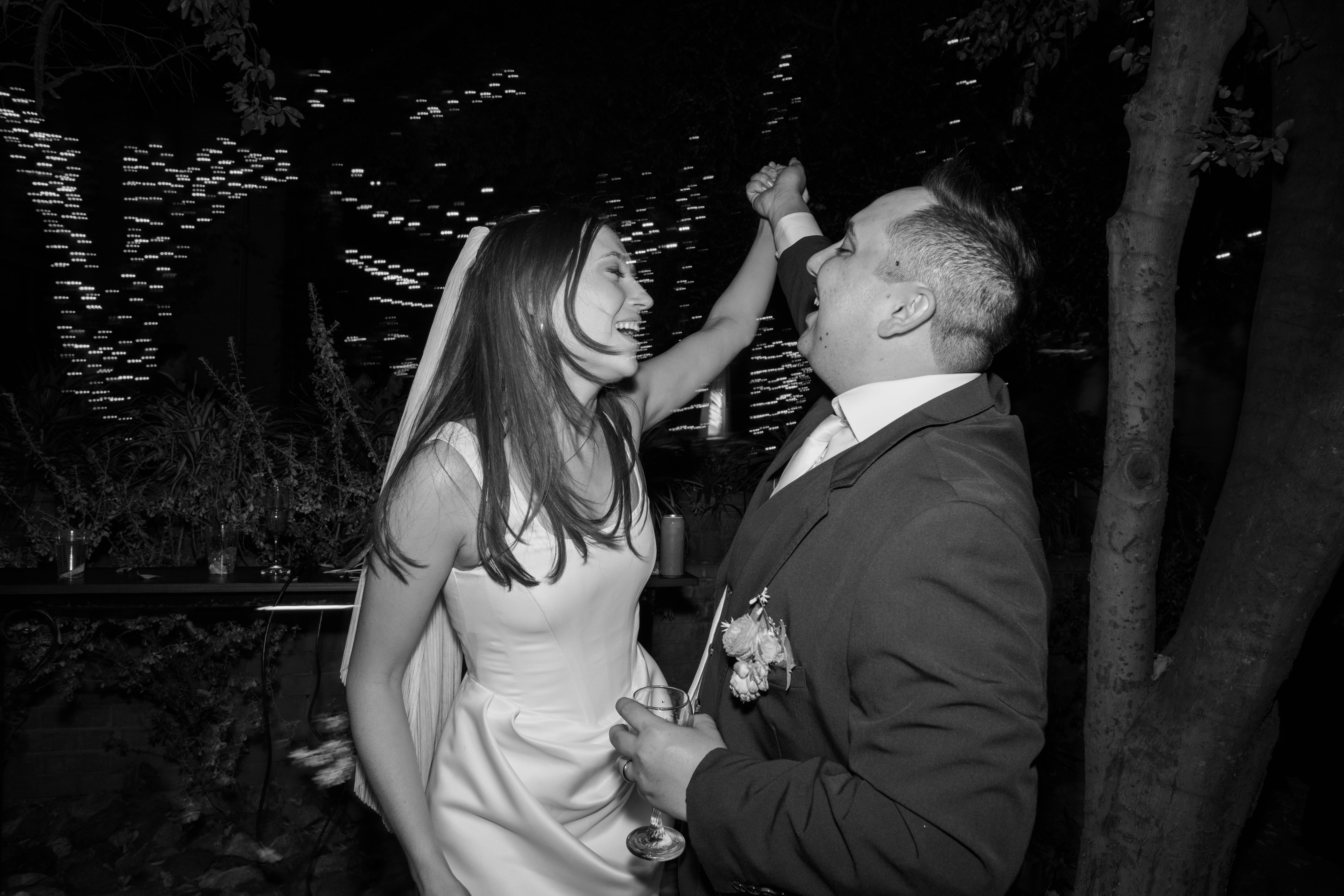 bride and groom dancing at reception