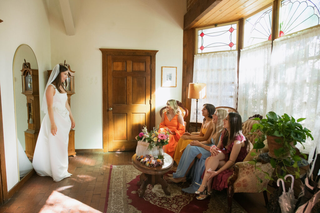 brides first look with bridal party 